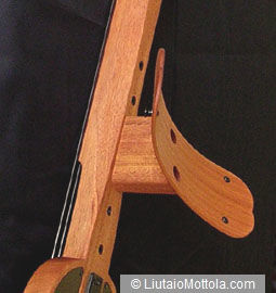 The wing can be attached to any of the mounting holes in the back of the body.